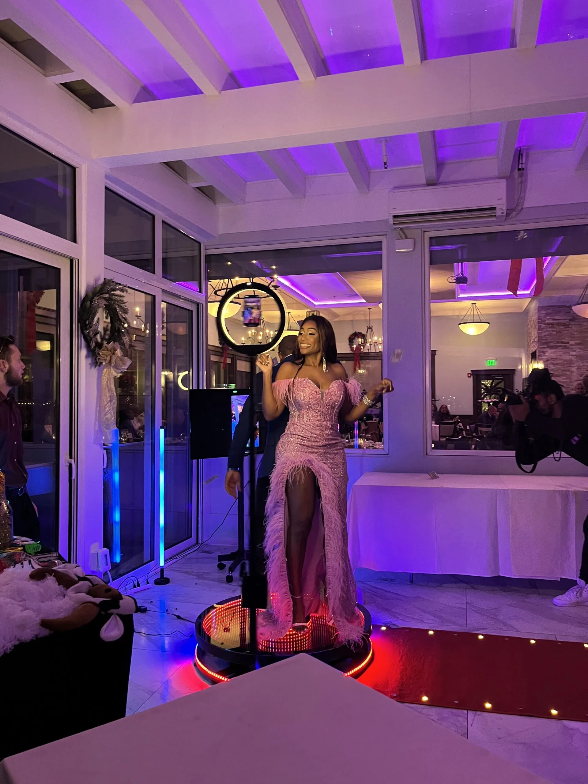 360 Photo Booth A black woman posing for 360 photo booth of Tesoro Moments