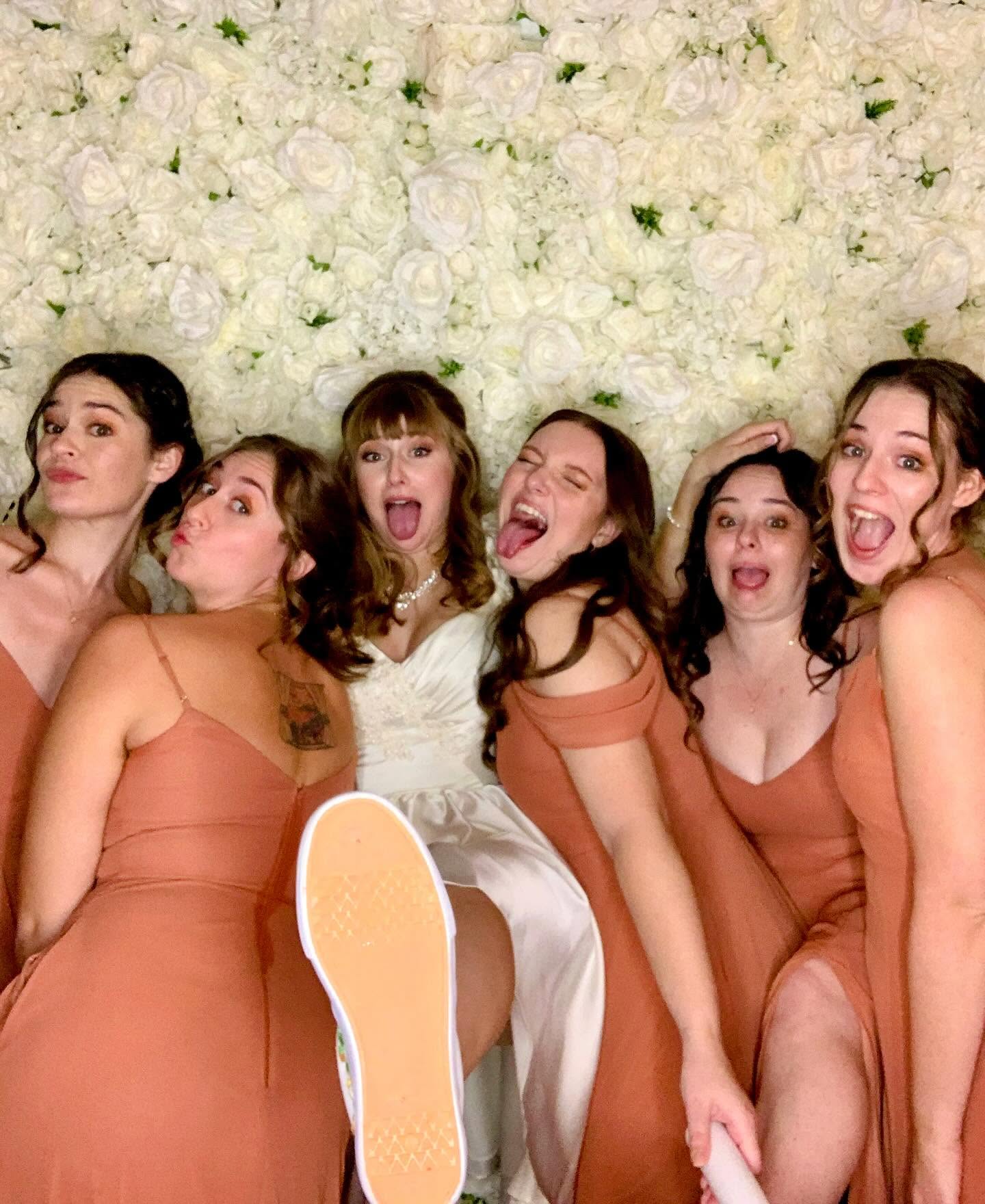 NJ Wedding4 bride and her bridesmaids striking a pose for Tesoro Moments Wedding Photo Booth